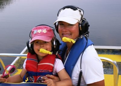 Mother and Daughter With Airboat Headsets